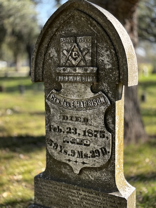 Image of old upright headstone for James Edward Harrison.